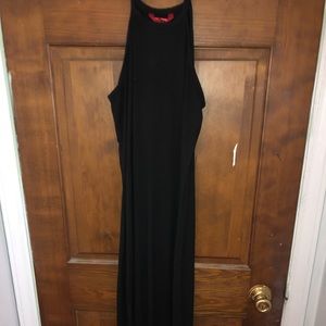 Long black racer back dress.